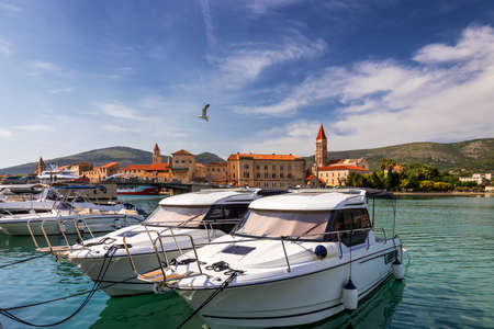 Trogir boats and waterfront view,  town in Croatia landmarks. View of historic buildings and port...