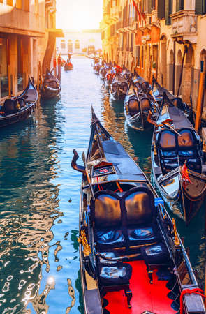 Canal with gondolas in Venice, Italy. Architecture and landmarks of Venice. Venice postcard with Venice gondolas.の写真素材