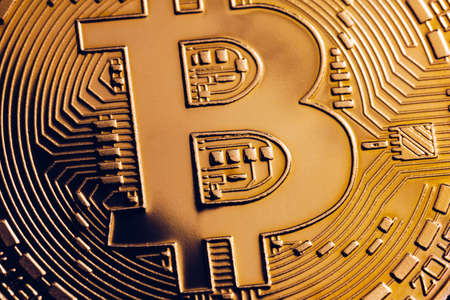 Crypto currency golden coin with bitcoin symbol on isolated on black background. Bitcoin Coin on...