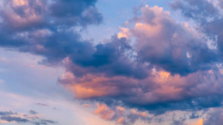 Beautiful sunset sky above clouds with dramatic light. Sunset sky for background, sunrise sky and...