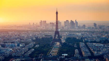 Panoramic aerial view of Paris, Eiffel Tower and La Defense business district. Aerial view of Paris at sunset. Panoramic view of Paris skyline with Eiffel Tower and La Defense. Paris, France.の写真素材