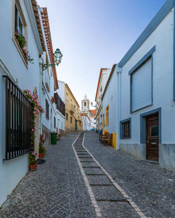 Street in the old town in the center of Lagos, Algarve region, Portugal. Narrow street in Lagos, Algarve, Portugal. Streets in the historic old town of Lagos, Algarve, Portugal.の写真素材