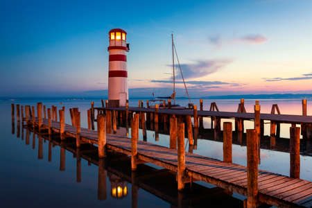 Lighthouse at Lake Neusiedl at sunset near Podersdorf, Burgenland, Austriaの写真素材
