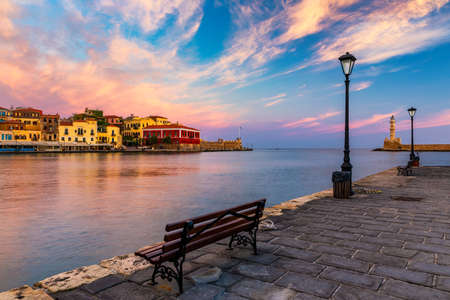 Venetian Harbour of the city of Chania at sunrise with turquoise water, Crete, Greece. View of the old port of Chania on Crete, Greece. Chania, Crete, Greece. View of the old port of Chania on Crete.の写真素材