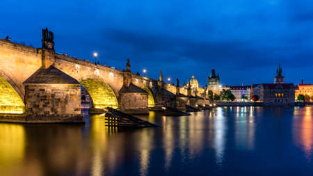 Charles Bridge in Prague in Czechia. Prague, Czech Republic. Charles Bridge (Karluv Most) and Old Town Tower. Vltava River and Charles Bridge. Concept of world travel, sightseeing and tourism.の写真素材