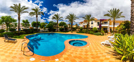 Great backyard with swimming pool, hot tub and lounge chairs. Swimming pool in backyard. Incredible...