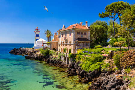 Santa Marta lighthouse and Municipal museum, Cascais, Lisbon, Portugal. Lighthouse Museum of Santa Marta in Cascais Portugal, as seen from Santa Marta Beach on a beautiful day. Cascais, Portugal.のeditorial素材