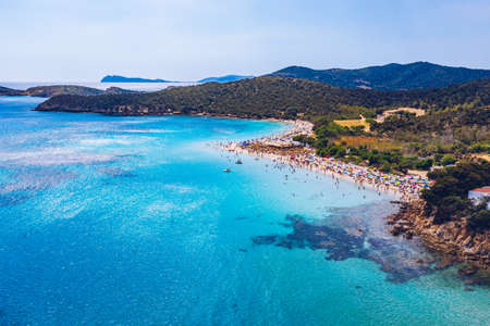 Aerial shot of Tuerredda beach on a beautiful day, Sardinia, Italy. Aerial drone view of Tuerredda...