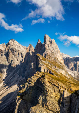View on Seceda peak. Trentino Alto Adige, Dolomites Alps, South Tyrol, Italy. Odle mountain range, Val Gardena. Majestic Furchetta peak. Odles group seen from Seceda, Santa Cristina Val Gardena.の写真素材
