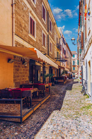 Alghero old town, Alghero street view on a beautiful day. Alghero, Italy. Panoramic aerial view of...