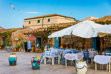 View of old port of Chania. Landmarks of Crete island. Greece. Bay of Chania at sunny summer day, Crete Greece. View of the old port of Chania, Crete, Greece. The port of chania, or Hania.の写真素材