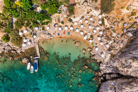Aerial view on St. Paul's bay in Lindos, Rhodes island, Greece. Panoramic shot overlooking St Pauls Bay at Lindos on the Island of Rhodes, Greece, Europe.の写真素材