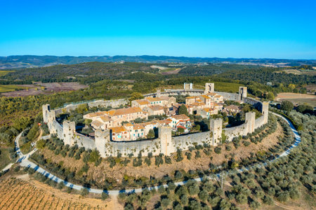 Beautiul aerial view of Monteriggioni, Tuscany medieval town on the hill. Tuscan scenic landscape vista with ancient walled city Monteriggioni, Italy.の写真素材