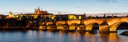 Charles Bridge in Prague in Czechia. Prague, Czech Republic. Charles Bridge (Karluv Most) and Old Town Tower. Vltava River and Charles Bridge. Concept of world travel, sightseeing and tourism.の写真素材