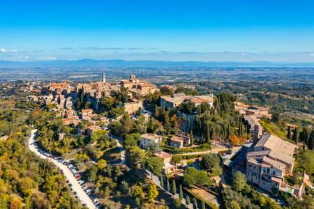 Village of Montepulciano with wonderful architecture and houses. A beautiful old town in Tuscany, Italy. Aerial view of the medieval town of Montepulciano, Italyの写真素材