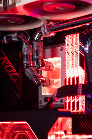Prague, Czech Republic - 21 July 2021: Close-up of high performance Desktop PC and water cooling...