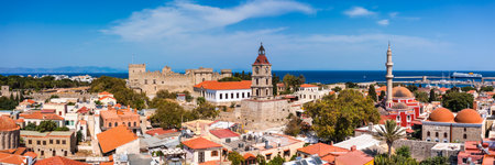 Panoramic view of Rhodes old town on Rhodes island, Greece. Rhodes old fortress cityscape with sea port at foreground. Travel destinations in Rhodes, Greece.の写真素材
