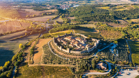 Beautiul aerial view of Monteriggioni, Tuscany medieval town on the hill. Tuscan scenic landscape vista with ancient walled city Monteriggioni, Italy.の写真素材