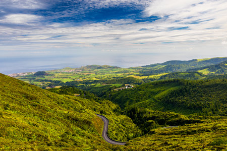 Azores panoramic view of natural landscape, wonderful scenic island of Portugal. Beautiful lagoons in volcanic craters and green fields. Tourist attraction and travel destination. Azores, Portugal.の写真素材