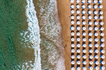 Aerial drone view over western coast and Glyfada beach, Island of Corfu, Greece. Glyfada Beach at Corfu Greece during the day.の写真素材