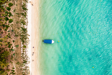 Mauritius beach aerial view of Mont Choisy beach in Grand Baie, Pereybere North. Mont Choisy, public...