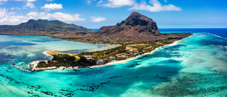 Aerial view of Le morne Brabant in Mauriutius. Tropical crystal ocean with Le Morne mountain and luxury beach in Mauritius. Le Morne beach with palm trees, white sand and luxury resorts, Mauritius.の写真素材