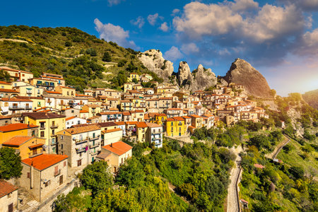 The picturesque village of Castelmezzano, province of Potenza, Basilicata, Italy. Cityscape aerial view of medieval city of Castelmazzano, Italy. Castelmezzano village in Apennines Dolomiti Lucane.の写真素材