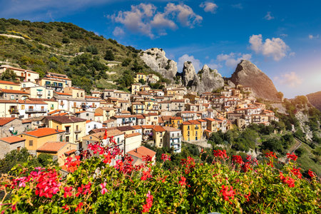 The picturesque village of Castelmezzano, province of Potenza, Basilicata, Italy. Cityscape aerial view of medieval city of Castelmazzano, Italy. Castelmezzano village in Apennines Dolomiti Lucane.の写真素材