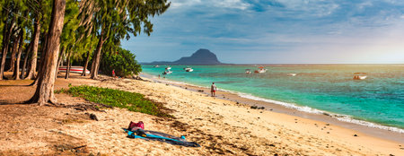 Beach of Flic en Flac with beautiful peaks in the background, Mauritius. Beautiful Mauritius Island...