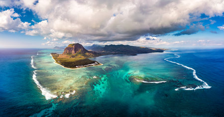 Aerial view of Mauritius island panorama and famous Le Morne Brabant mountain, beautiful blue lagoon and underwater waterfall. Le Morne Brabant peninsula and Underwater Waterfall, Mauritius.の写真素材