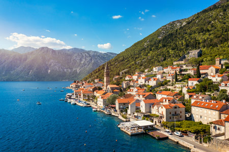 View of the historic town of Perast at famous Bay of Kotor on a beautiful sunny day with blue sky...