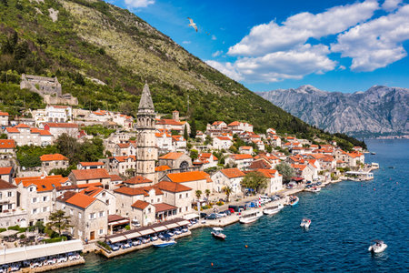 View of the historic town of Perast at famous Bay of Kotor on a beautiful sunny day with blue sky...