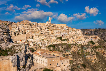 Panoramic view of the ancient town of Matera (Sassi di Matera) in a beautiful autumn day,...