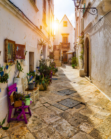 Scenic sight in Locorotondo, Bari Province, Apulia (Puglia), Italy. Characteristic streets in the Locorotondo in Puglia, Italy. Locorotondo is a town of the Metropolitan City of Bari, Apulia, Italy.の写真素材