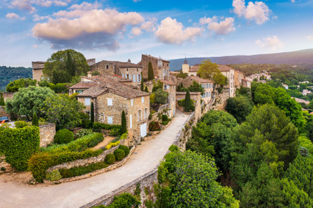 Menerbes village in Provence on a summer day, France, Luberon, Vaucluse. Village of Menerbes, the village and the Luberon mountains also called the most beautiful village of Luberon, France, Provence.の写真素材