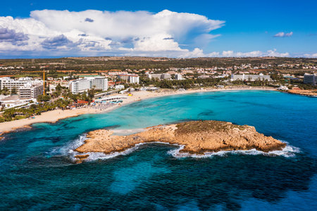 Aerial view of beautiful Nissi beach in Ayia Napa, Cyprus. Nissi beach in Ayia Napa famous tourist beach in Cyprus. A view of a azzure water and Nissi beach in Aiya Napa, Cyprus.の写真素材