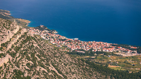 Bol on Brac island panoramic aerial view, Dalmatia, Croatia. Town of Bol from Vidova Gora aerial view, Island of Brac, Dalmatia, Croatia.の写真素材