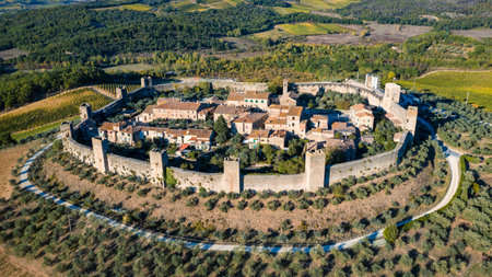 Beautiul aerial view of Monteriggioni, Tuscany medieval town on the hill. Tuscan scenic landscape vista with ancient walled city Monteriggioni, Italy.の写真素材
