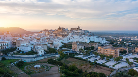 View of Ostuni white town, Brindisi, Puglia (Apulia), Italy, Europe. Old Town is Ostuni's citadel. Ostuni is referred to as the White Town. Ostuni white town skyline and church, Brindisi, Italy.の写真素材