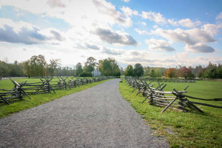 A gravel road leading into the countryの写真素材