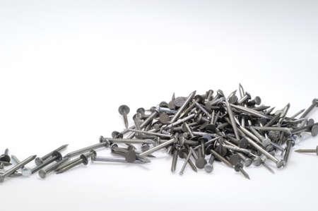 heap of iron nails on white background - DSC0939の写真素材