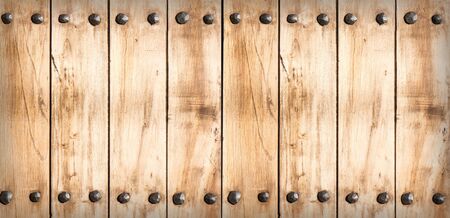 Wood clapboards background with several nails forming a frameの写真素材