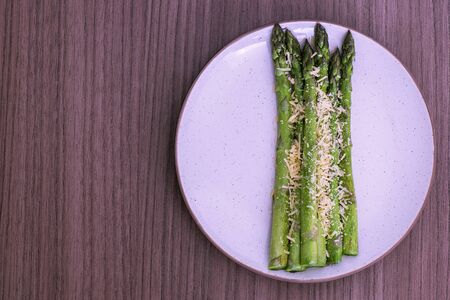 Delicious fresh roasted asparagus whit parmesan cheeseの写真素材