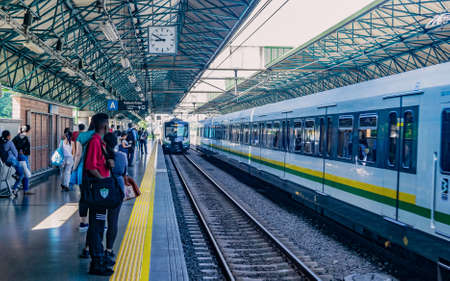 MEDELLIN, COLOMBIA - JUNE 23, 2018: People waiting in one of the Medellin metro stationsのeditorial素材