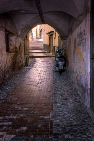 Sanremo, Italy - 05/25/2016 - One of the old scenic narrow streets of historic Sanremo, Italyのeditorial素材