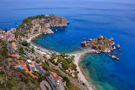 Aerial view of Isola Bella beach coast in Taormina, Sicily, Italyの写真素材
