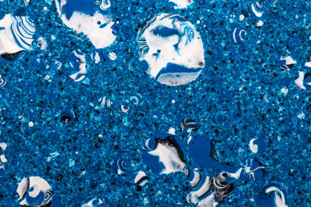 Grainy and bubbly blue plastic surface. Top view. Close-up shot. Abstract ideaの写真素材