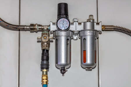 Pressure gauge on the air compressor to measure liquid air pressure for the car air compressor on...