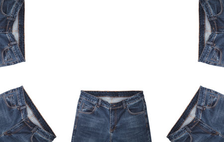 Front pockets, waist areas, zippers, and buttons of five pairs of dark blue jeans isolated on white background. Close up shot. Jeans encircle Copy space in the middle. Clothing store concept.の写真素材
