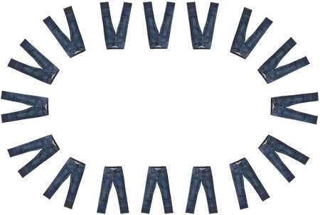 Sixteen pairs of dark blue jeans isolated on white background. Close up shot. Jeans encircle copy space in the middle. Clothing, jeans store concept.の写真素材